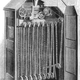 The inner workings of a kinetoscope. Instead of a reel, film was in a long strip so it could replay endlessly. (Wikipedia/Shizhao)
